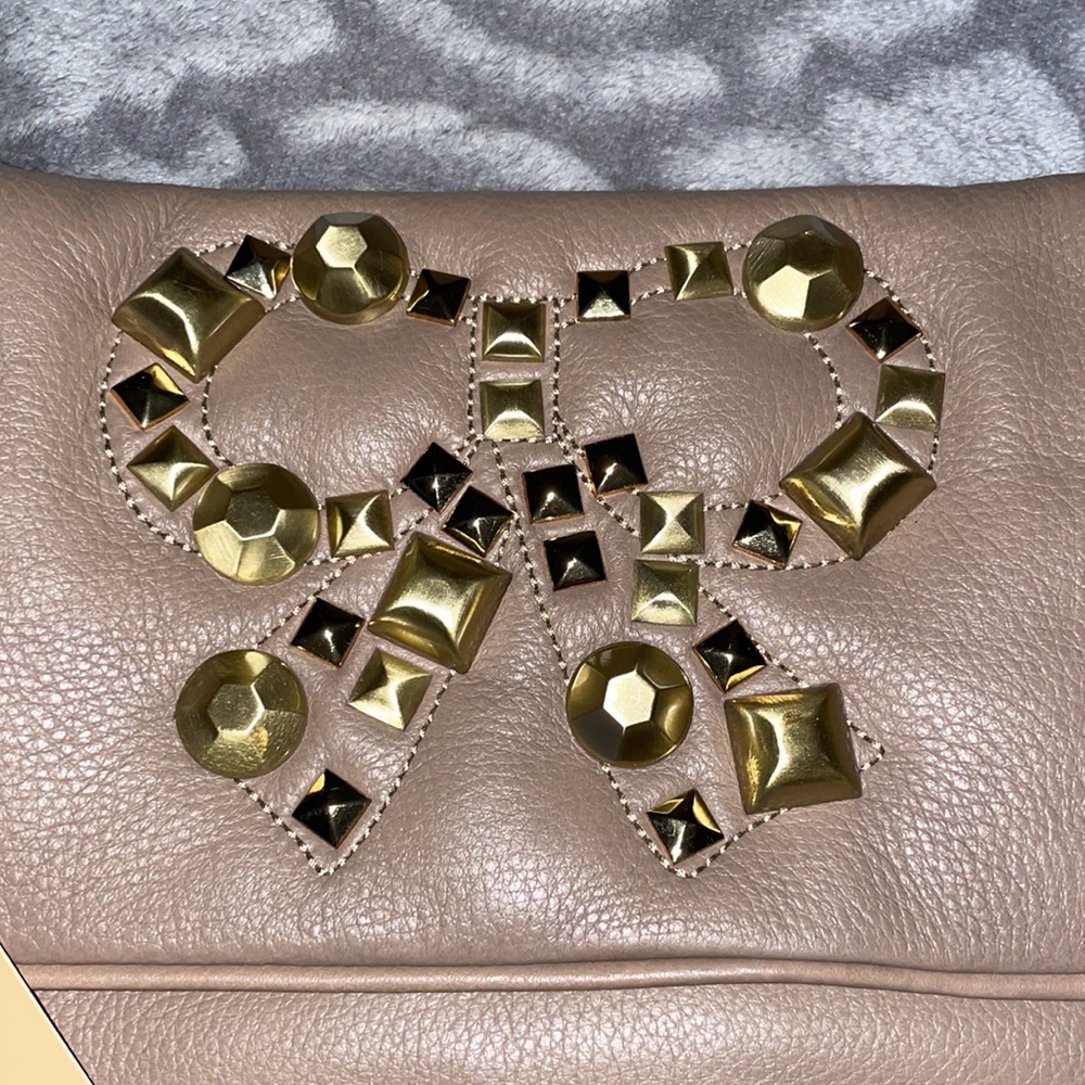 FELIX REY CLUTCH